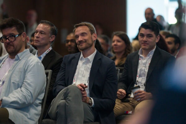 SIIM Annual Meeting attendees listening attentively during the conference, showcasing professional networking and medical imaging innovations; a key event for radiology and healthcare professionals.