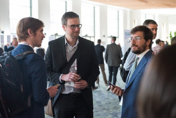 Conference networking at SIIM Annual Meeting, radiology and medical imaging professionals engaging and discussing innovations in healthcare technology.