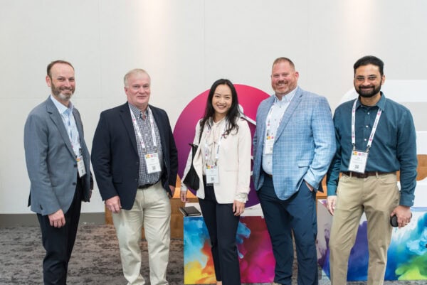 Innovative healthcare professionals networking at the SIIM Annual Meeting, showcasing advancements in medical imaging, informatics, and AI in radiology.