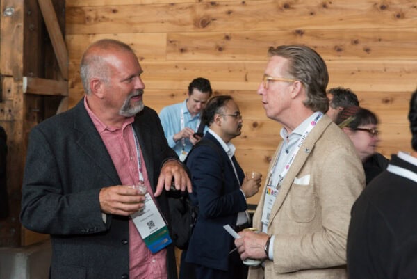 Innovative medical professionals networking at SIIM Annual Meeting, engaging in medical imaging discussions and collaboration to advance healthcare technology.