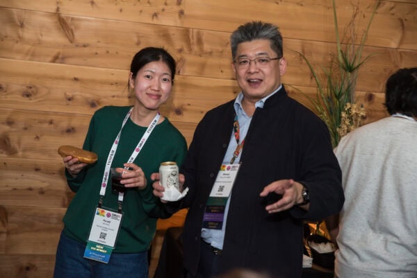 Enjoying networking at the SIIM Annual Meeting, attendees discuss advancements in medical imaging and informatics, fostering collaboration and innovation in the industry.