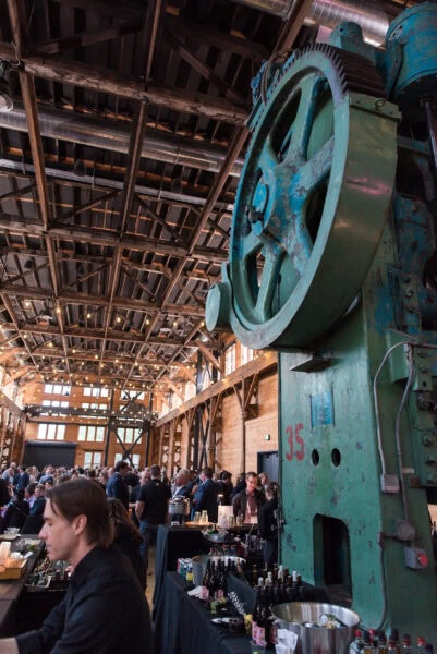 SIIM Annual Meeting venue featuring industrial vintage machinery and a packed event space for medical imaging professionals and radiology experts.