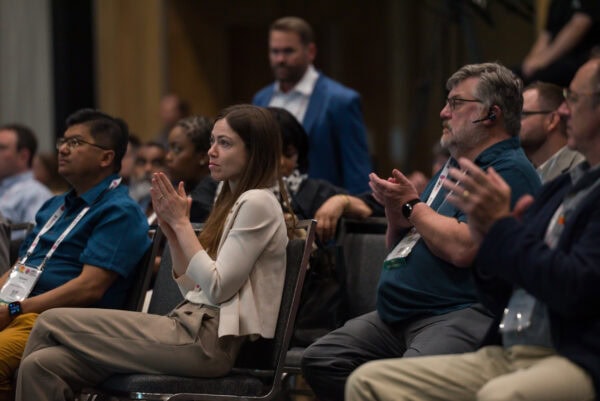 Focused audience at the SIIM Annual Meeting, featuring healthcare professionals engaging in innovative medical imaging and informatics discussions.