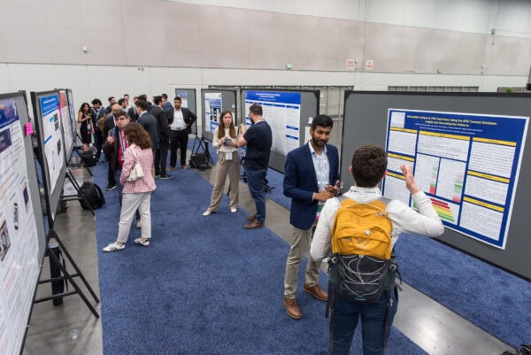 Analysis of scientific research posters at the SIIM annual meeting focused on medical imaging, radiology innovation, and AI in healthcare, with attendees discussing the latest advances in imaging technology.