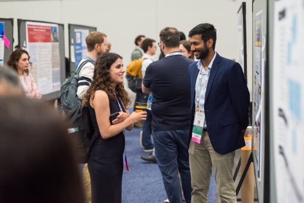 Conference attendees networking at the SIIM Annual Meeting, showcasing radiology and imaging innovation, medical informatics, and professional development in a vibrant healthcare technology environment.