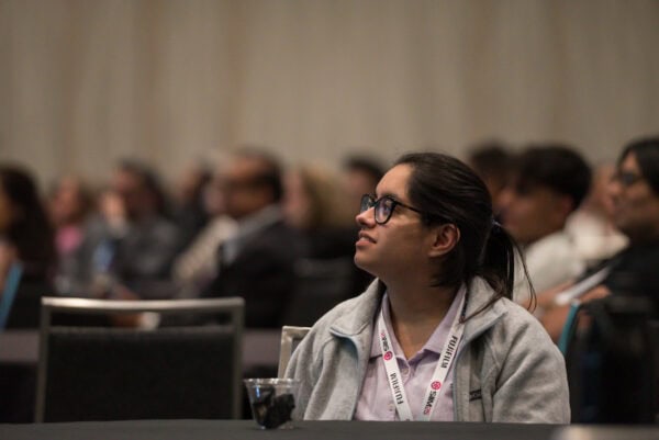 Innovative medical conference attendee engaged in SIIM Annual Meeting focused on medical imaging and health informatics.
