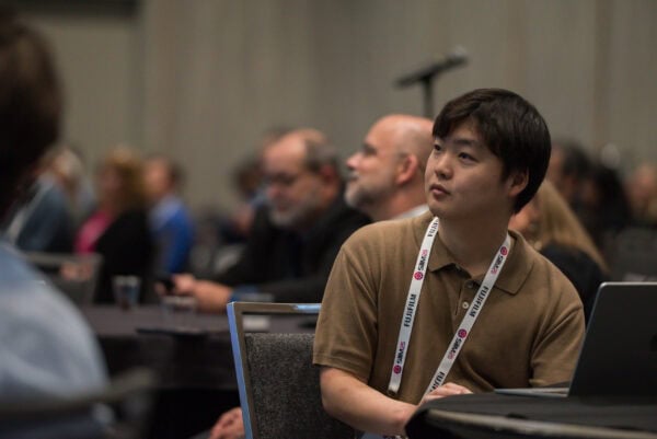 Innovative medical professionals attending the SIIM Annual Meeting focused on imaging informatics, AI in healthcare, and radiology advancements at the premier radiology conference.