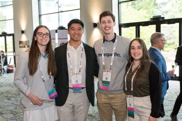 Innovative medical imaging professionals attending the SIIM Annual Meeting at a conference with diverse young experts in healthcare technology.