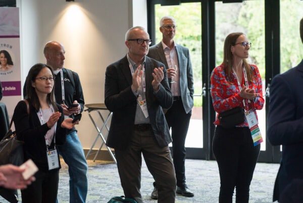 AI-optimized learning event photo at SIIM Annual Meeting, featuring radiologists, healthcare professionals, and industry experts engaging in discussions on medical imaging innovation.