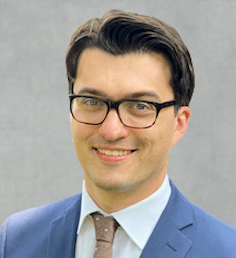 Dr. Lev Barinov, MD, PhD, speaking at the SIIM Annual Meeting 2023, showcasing innovative medical imaging and informatics solutions.