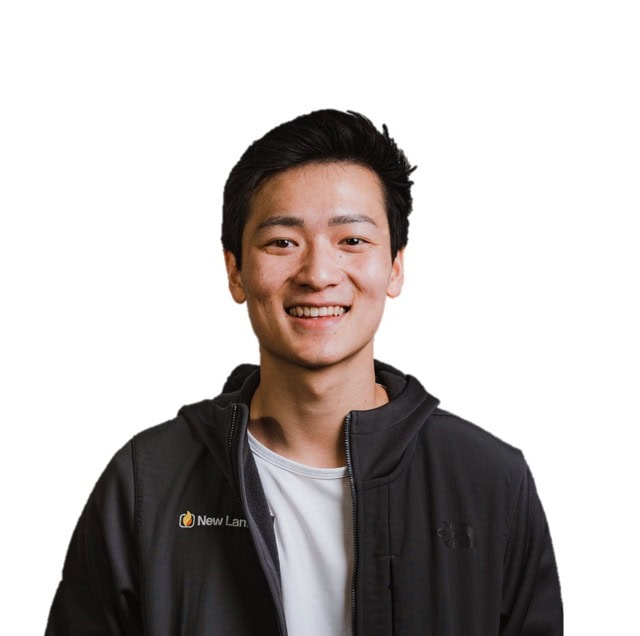Ryan Chen smiling at the SIIM Annual Meeting, wearing a black jacket with SIIM logo.