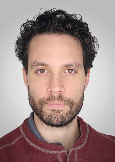 Portrait of Gustavo Lischinsky Moreno, a speaker at the SIIM Annual Meeting, showcasing his professional appearance and engagement in medical imaging discussions.
