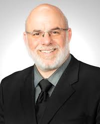 An SEO-friendly ALT tag highlighting a professional speaker at the SIIM Annual Meeting, emphasizing radiology, medical imaging, and healthcare innovation.