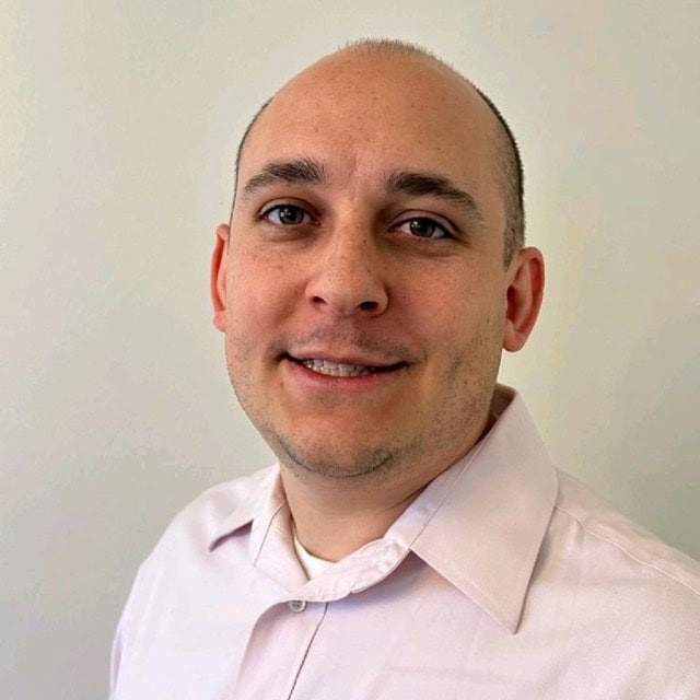 Matthew Guillen, CIIP, attending the SIIM Annual Meeting, engaging with healthcare imaging professionals, showcasing medical imaging innovations.