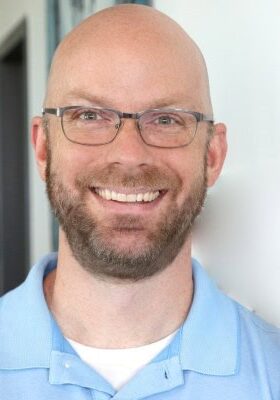 Portrait of Matt Clark smiling at the SIIM Annual Meeting, showcasing professional networking and healthcare imaging technology.