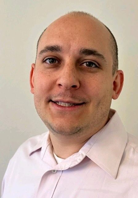 Matthew Guillen, CIIP, attending the SIIM Annual Meeting, engaging with healthcare imaging professionals, showcasing medical imaging innovations.