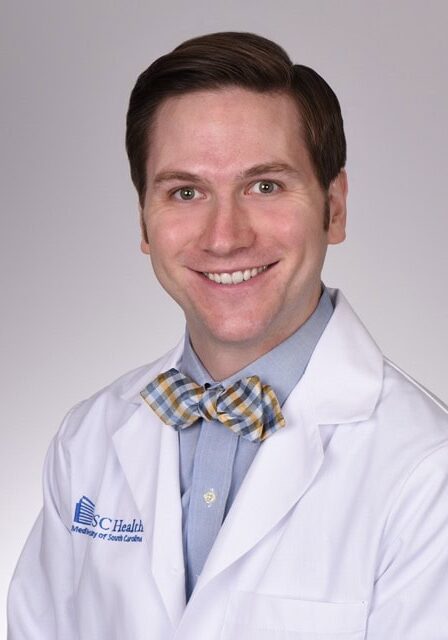 Dr. Morgan P. McBee, a medical professional specializing in imaging informatics, attending the SIIM Annual Meeting to discuss innovations in medical imaging and healthcare IT.