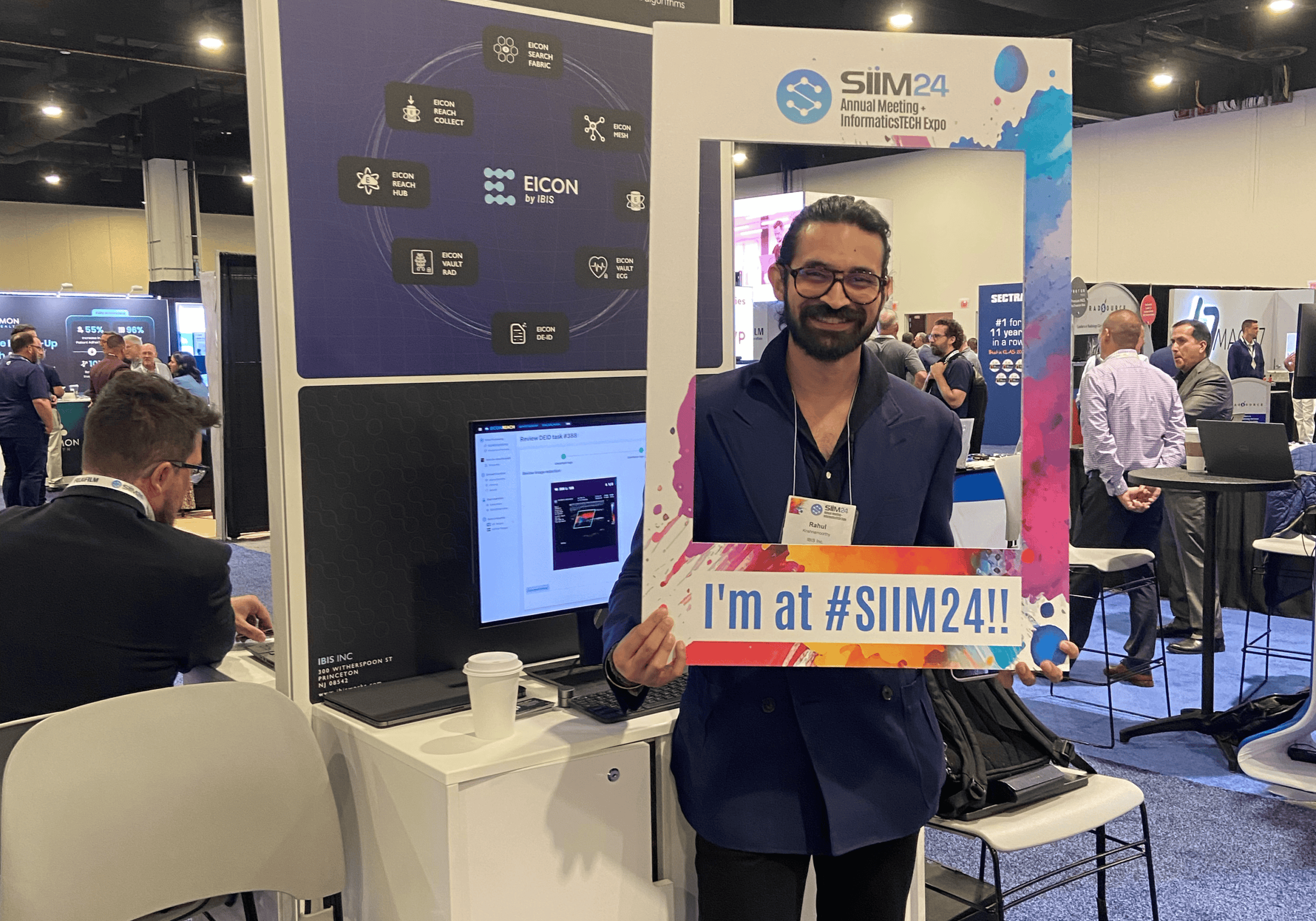Attendee at SIIM 2024 Annual Meeting showcasing innovative imaging technology at the expo.