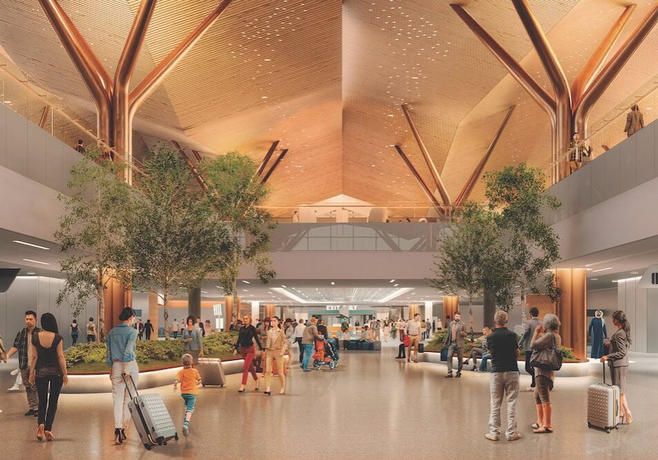 1. Modern airport terminal with lush trees, travelers with luggage, and contemporary architecture, showcasing a welcoming and spacious environment for SIIM Annual Meeting attendees.
